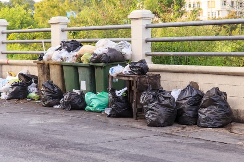 Site image showing office clearance crew assessing items