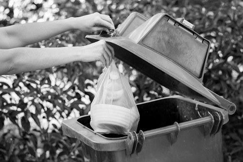 Sorting recyclable materials during an office clearance in Dalston